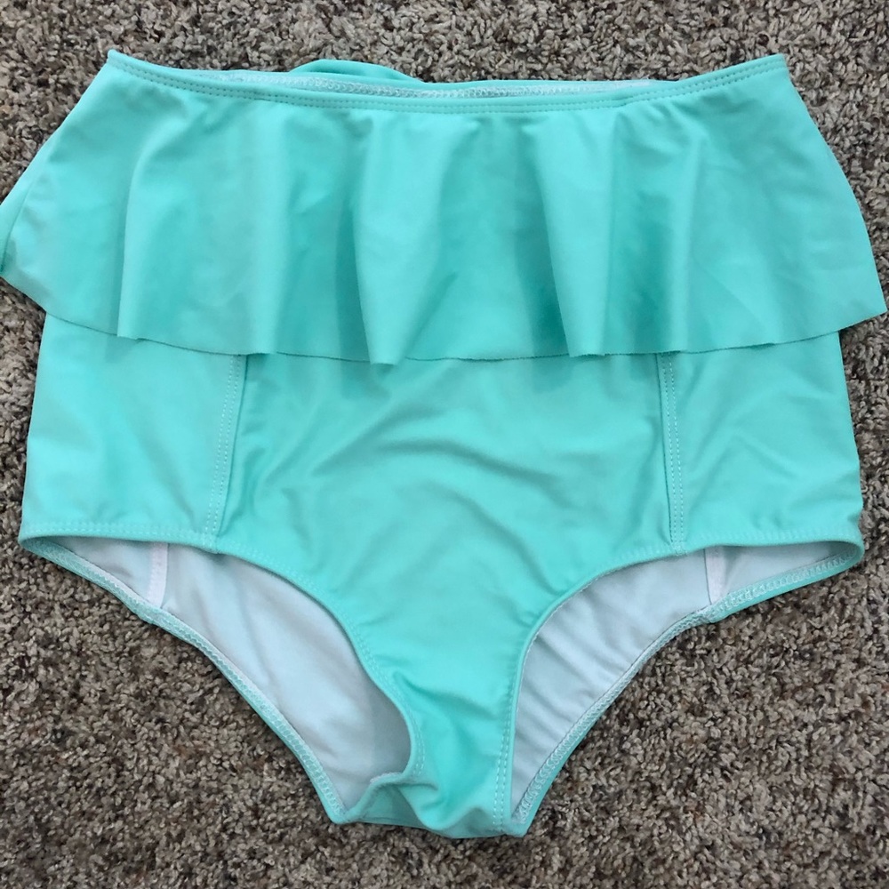 Kortni jeane swim bottoms.  High rise with ruffle.